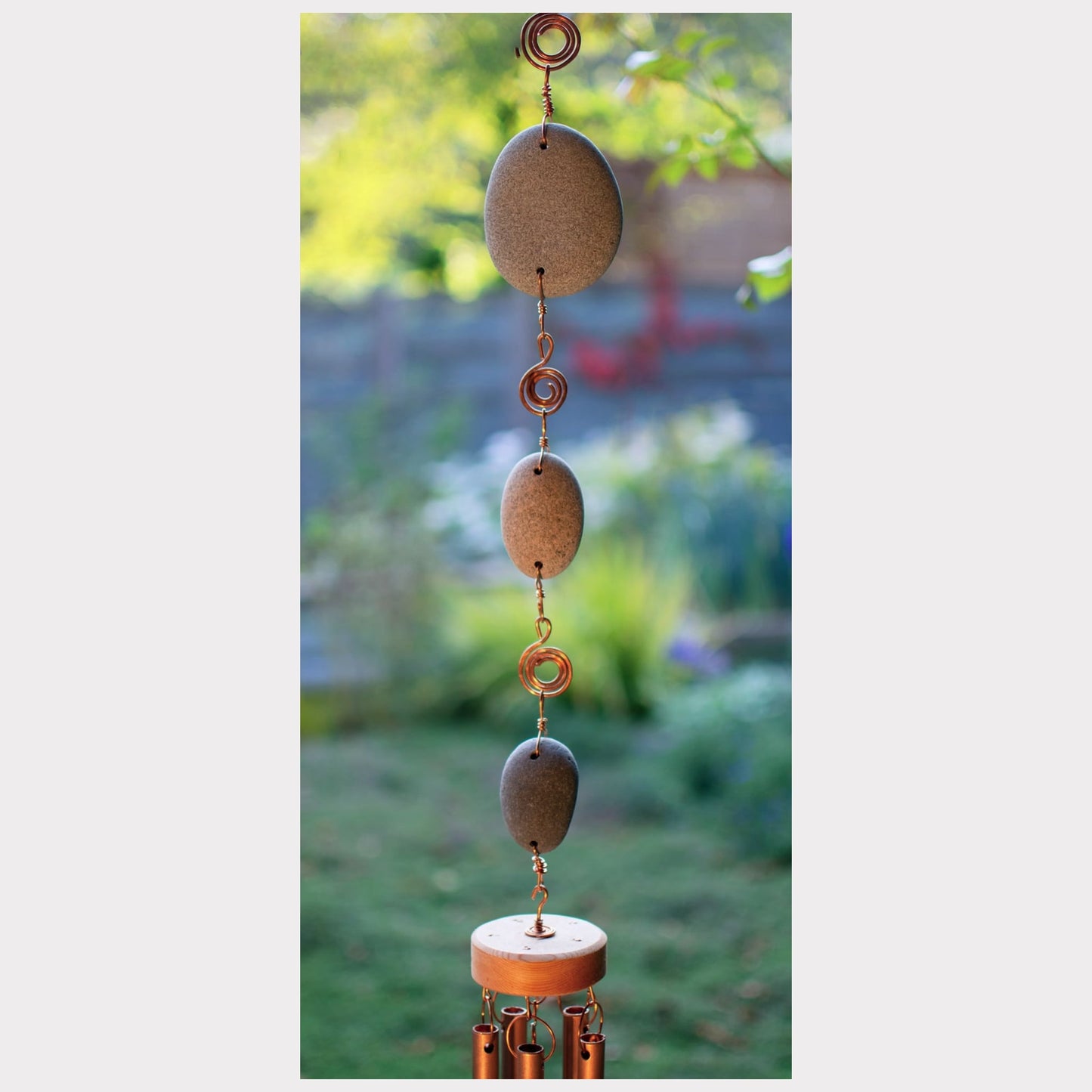 detail, natural beach stone wind chime