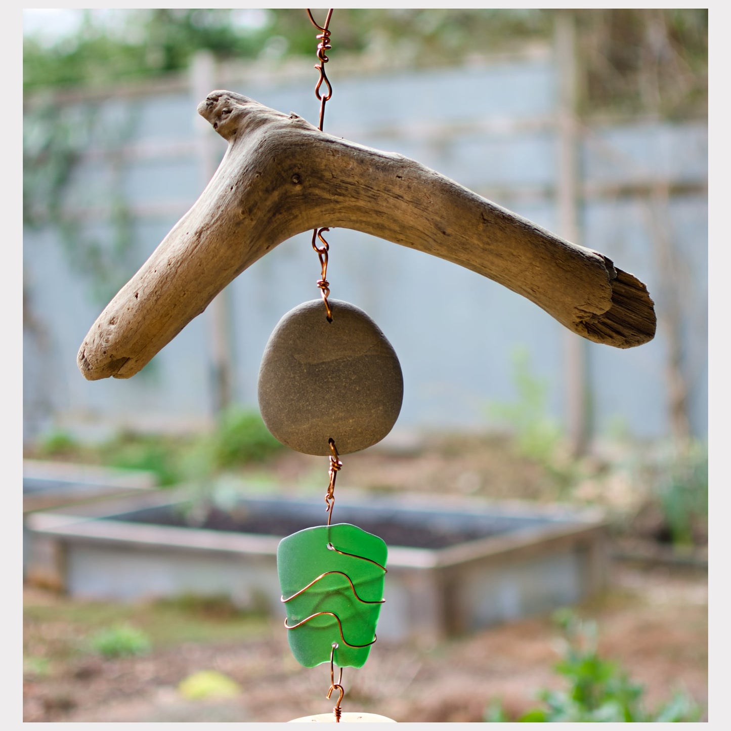 detail, driftwood wind chime