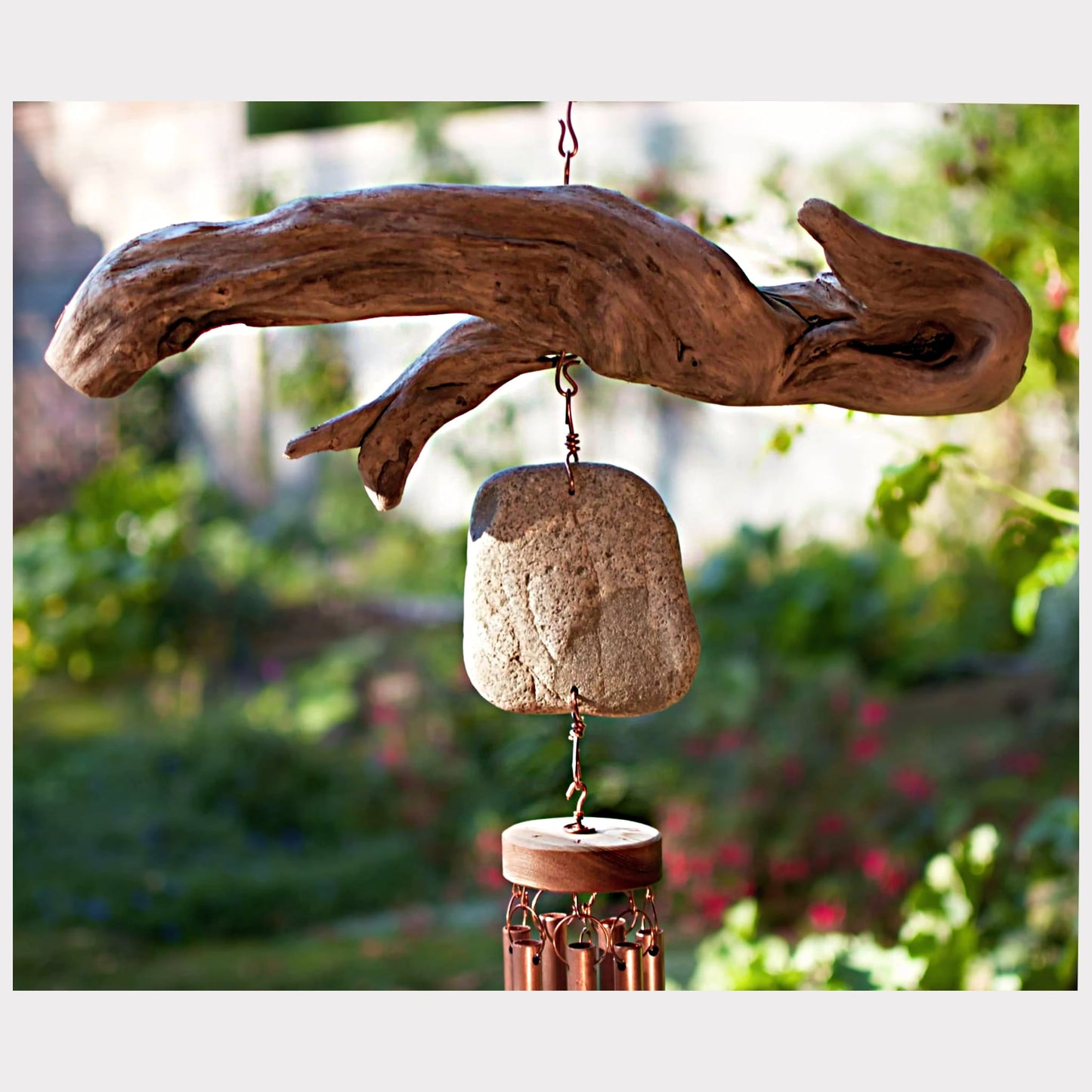 detail, driftwood and beach stone wind chime