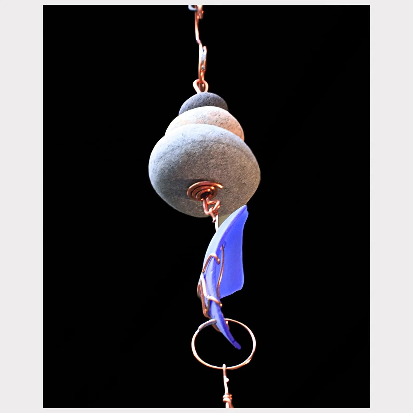 bottom view, zen beach stone wind chime