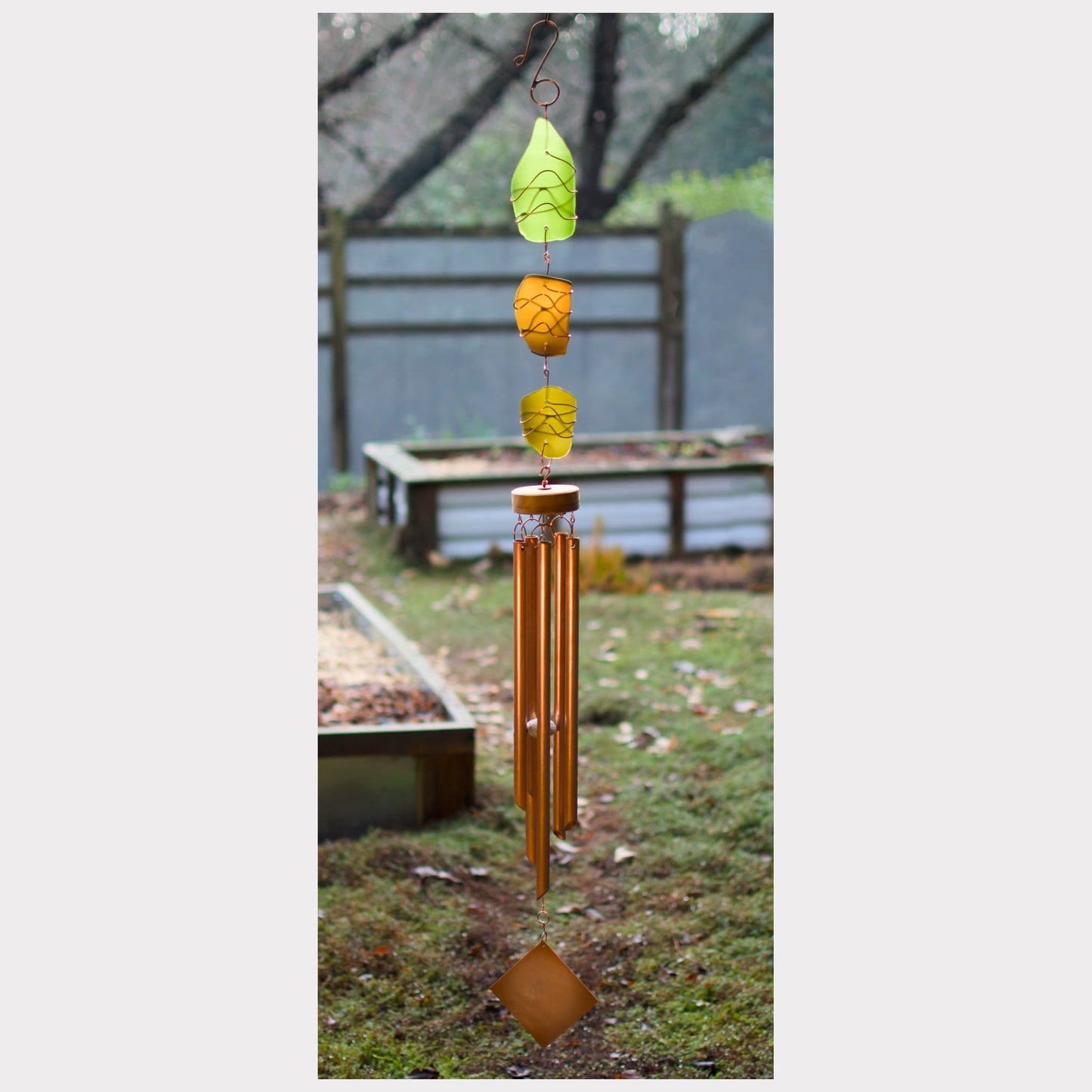 Sea glass and copper handcrafted art wind chime.