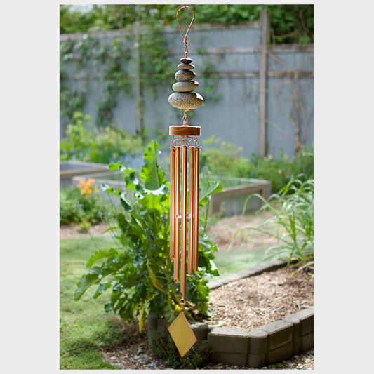 Zen beach stone wind chime with five copper chimes.