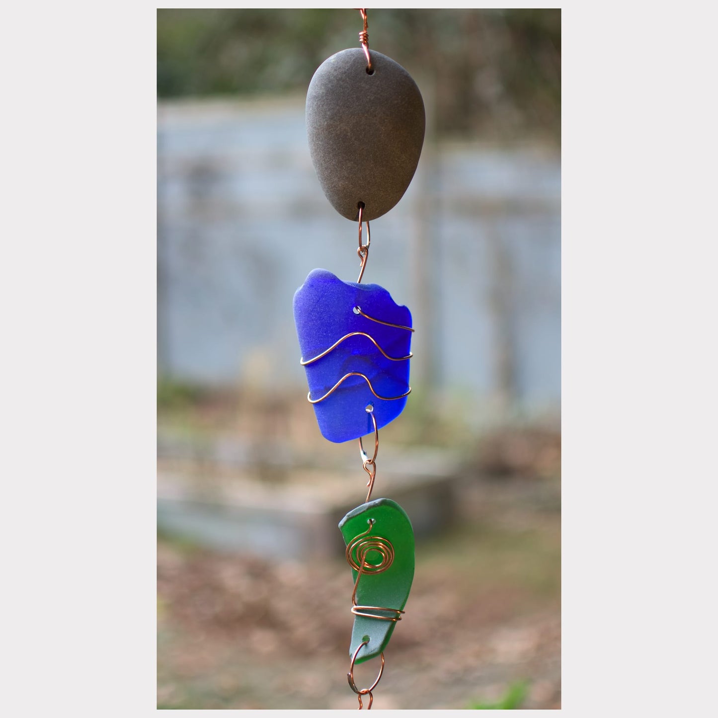 zoom detail, beach stone sea glass wind chime