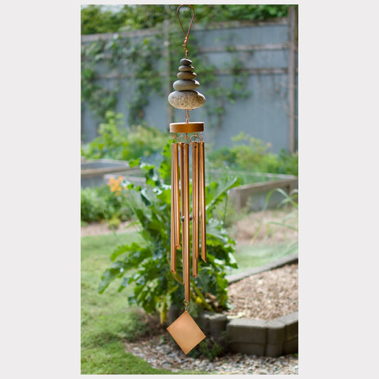 Zen natural beach stone wind chime with seven copper chimes.