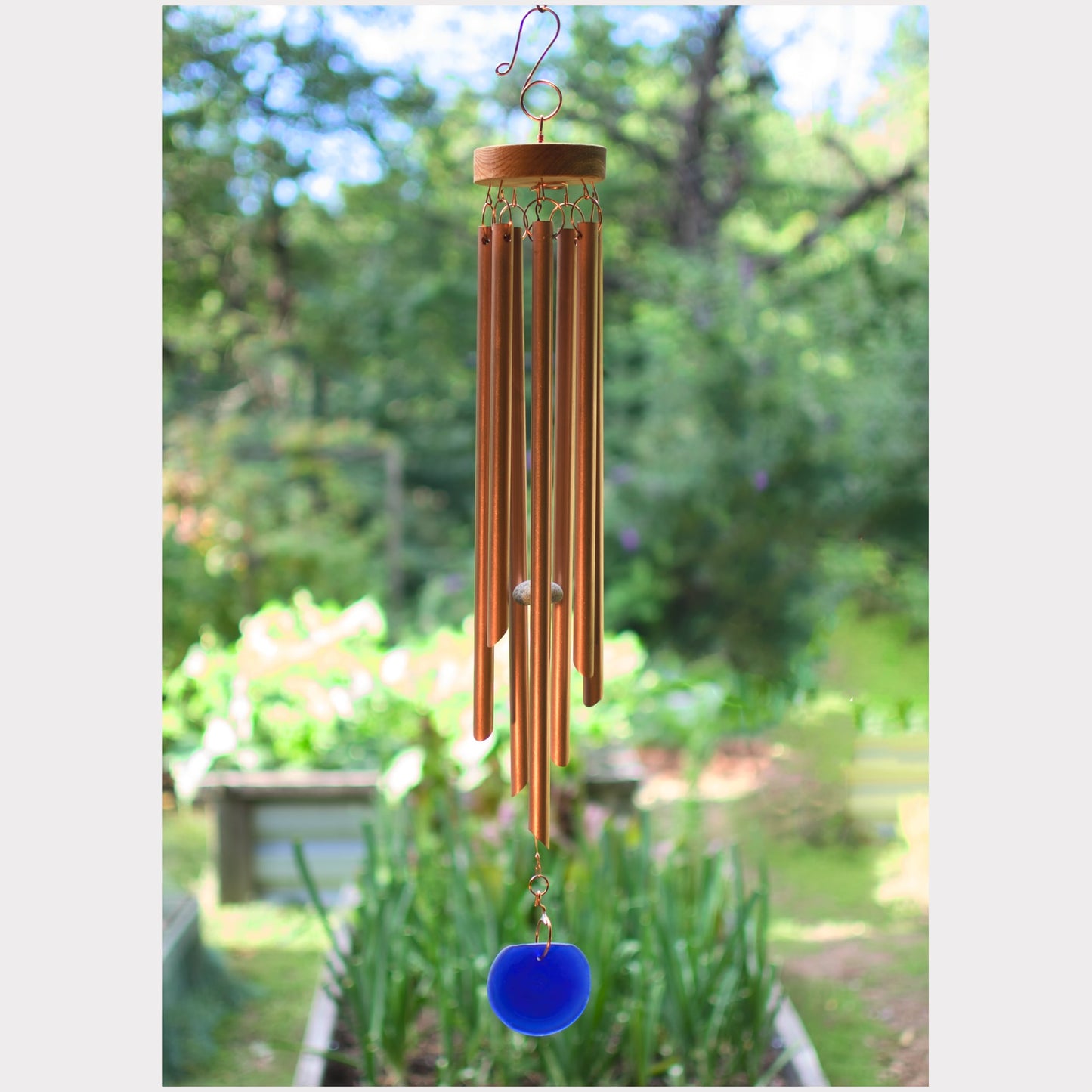 Copper wind chime with 7 chimes and a blue glass windsail.
