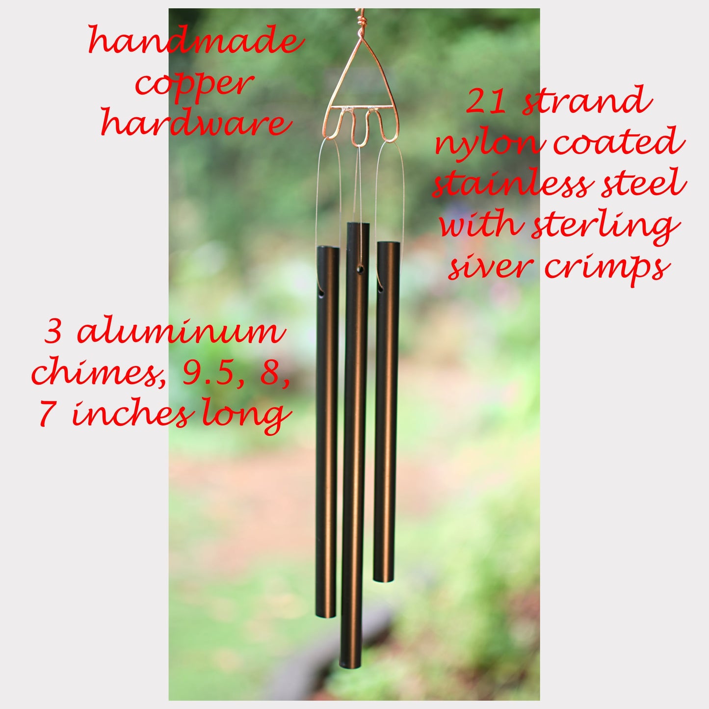Handmade copper hardware wind chime with text detailing specifications on a blurred natural background
