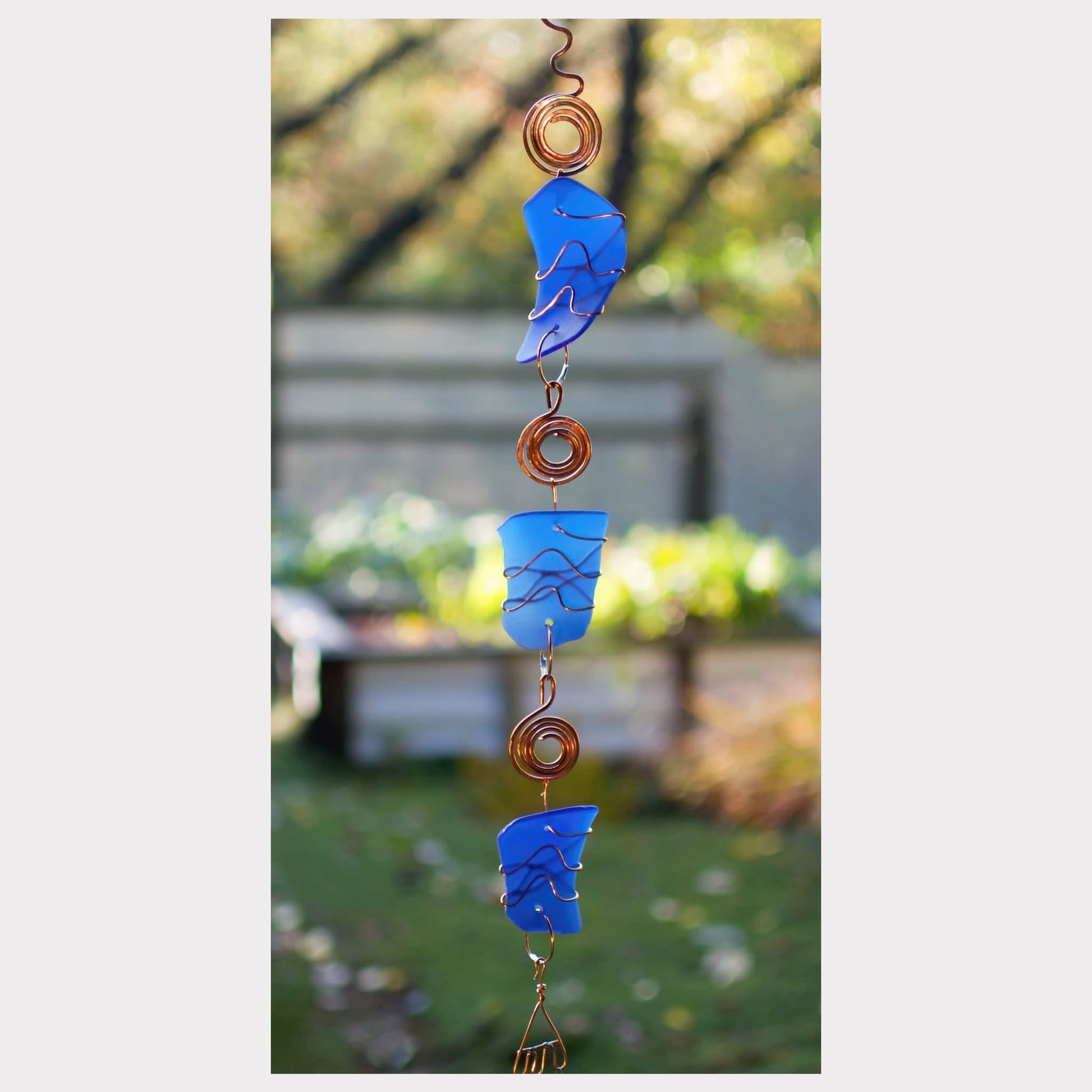 detail, blue glass wind chime