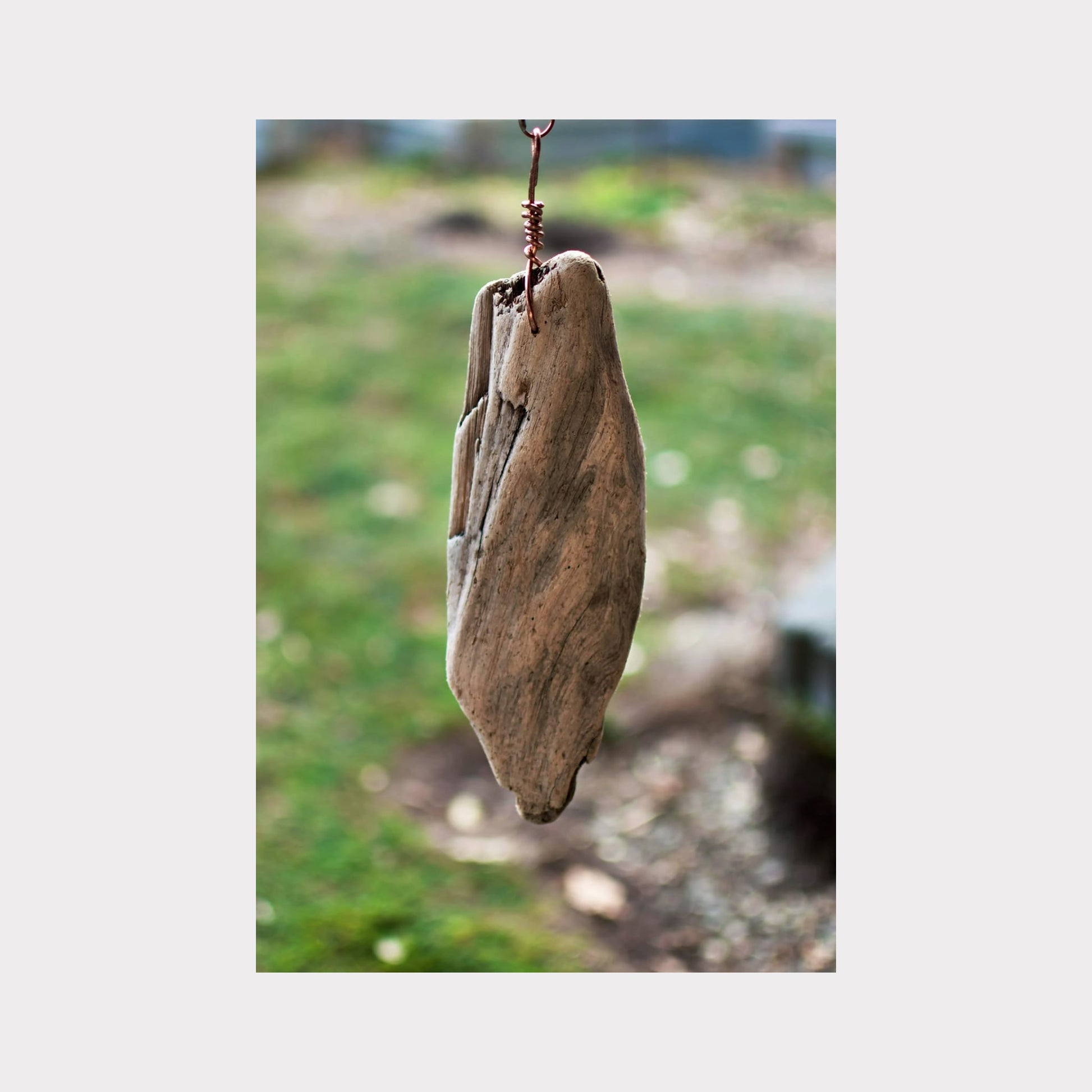 rustic driftwood windsail for a copper handmade wind chime