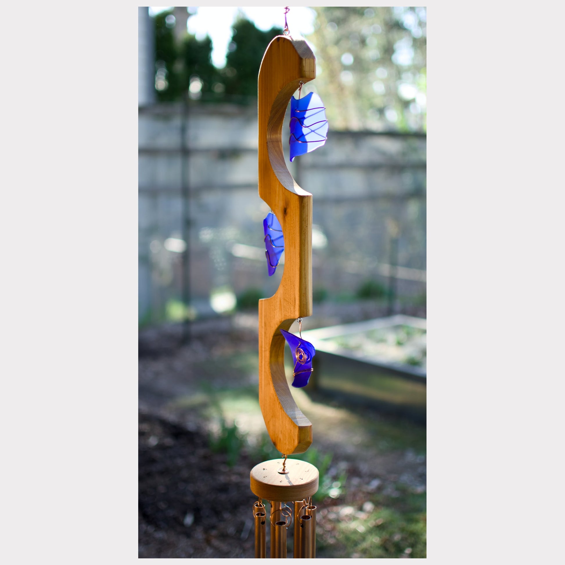 side view glass and cedar wind chime