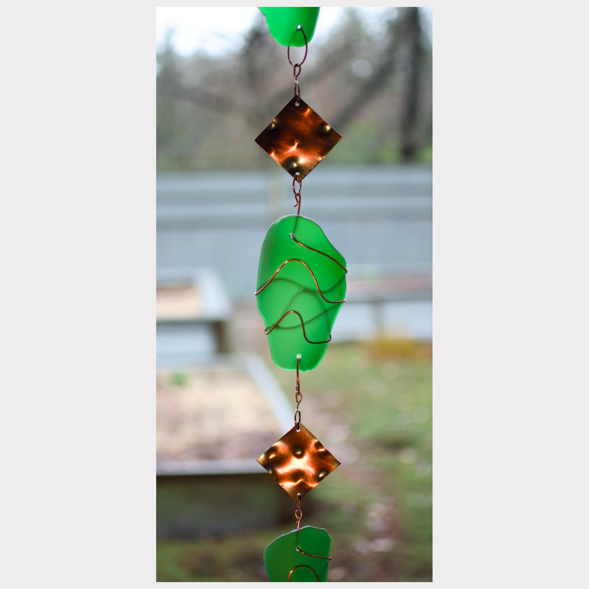 zoom detail beach glass wind chime
