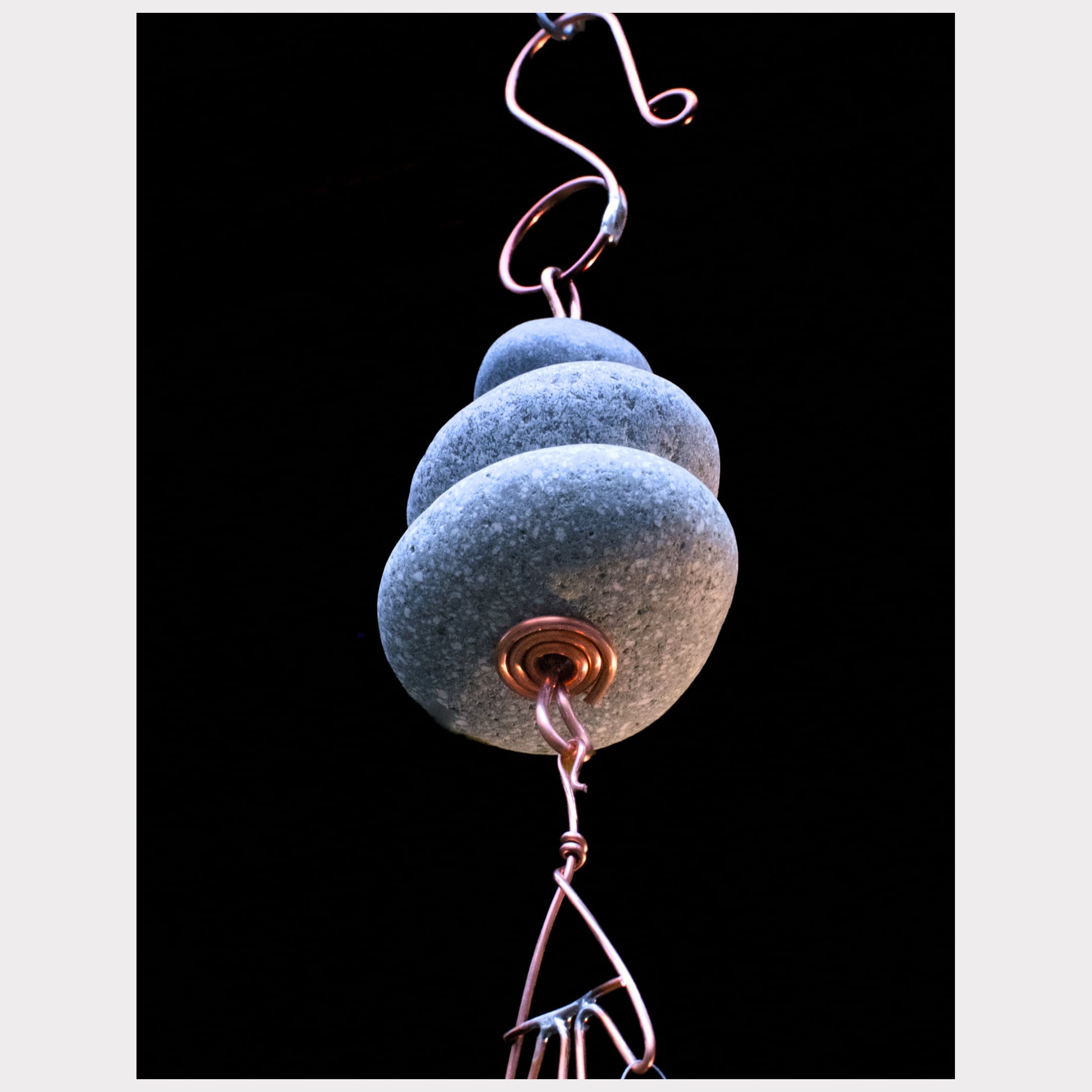 bottom view, zen beach stone wind chime