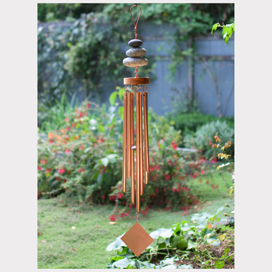 Large zen wind chime with three natural beach stones and seven copper chimes.