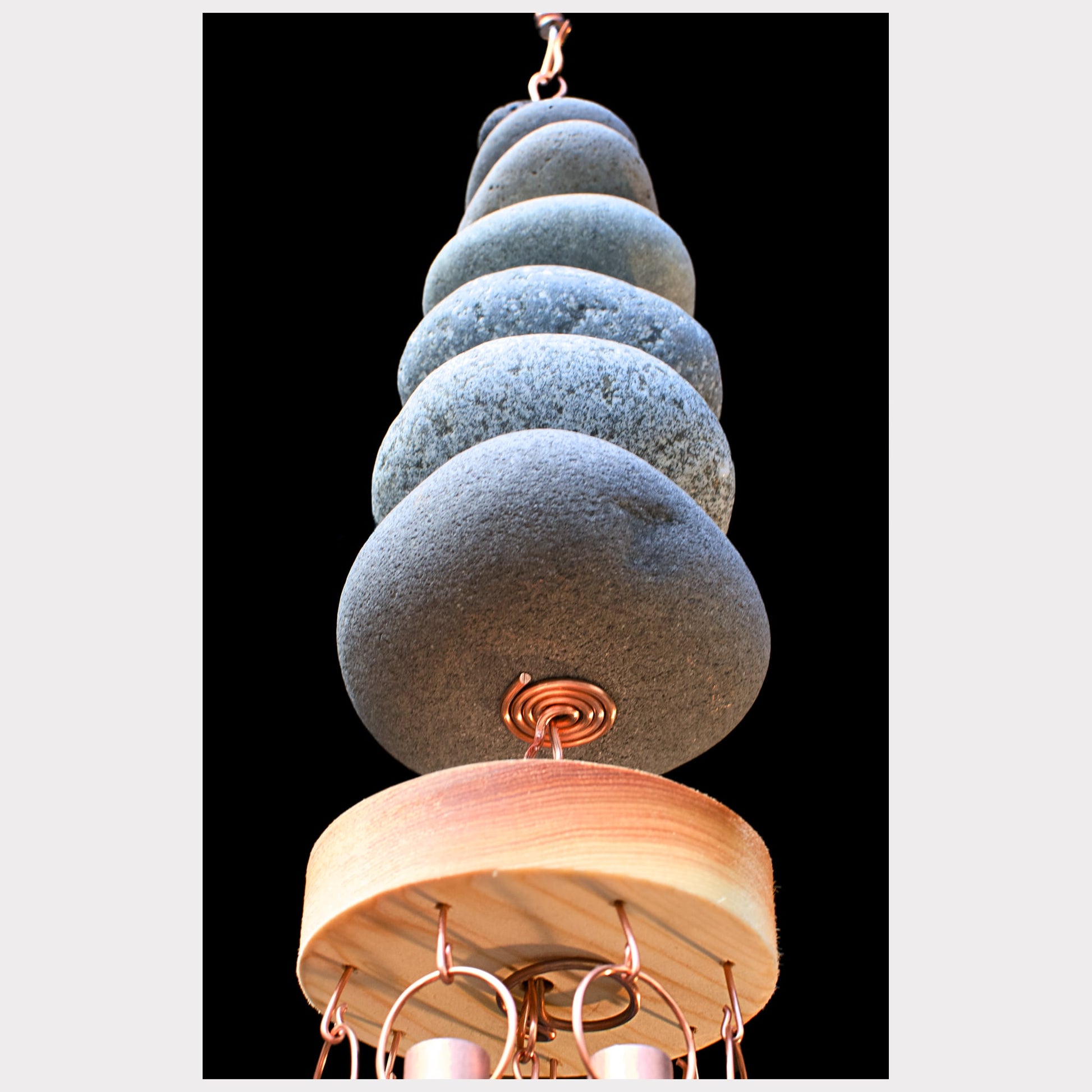 bottom view, zen beach stone wind chime