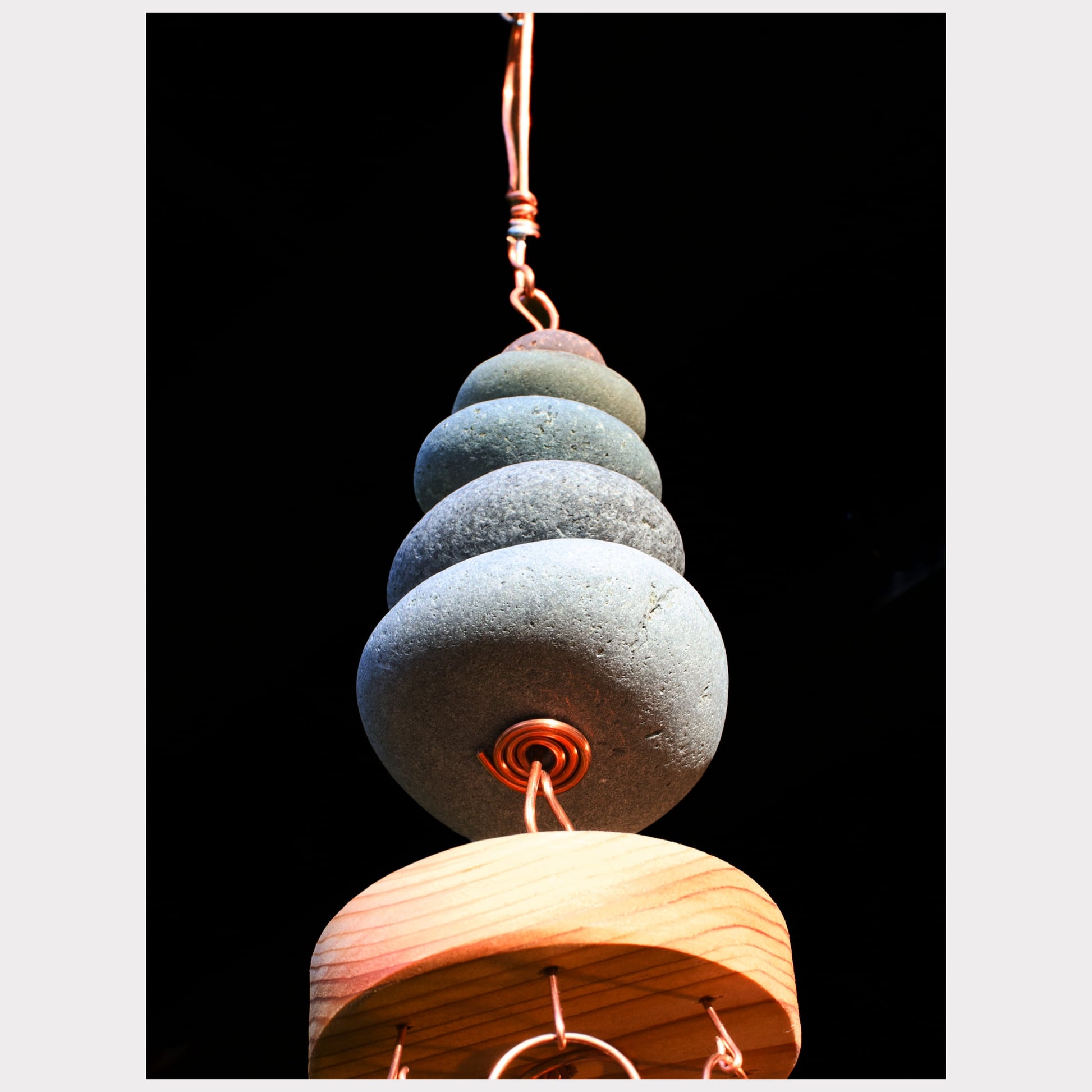bottom view, zen beach stone wind chime