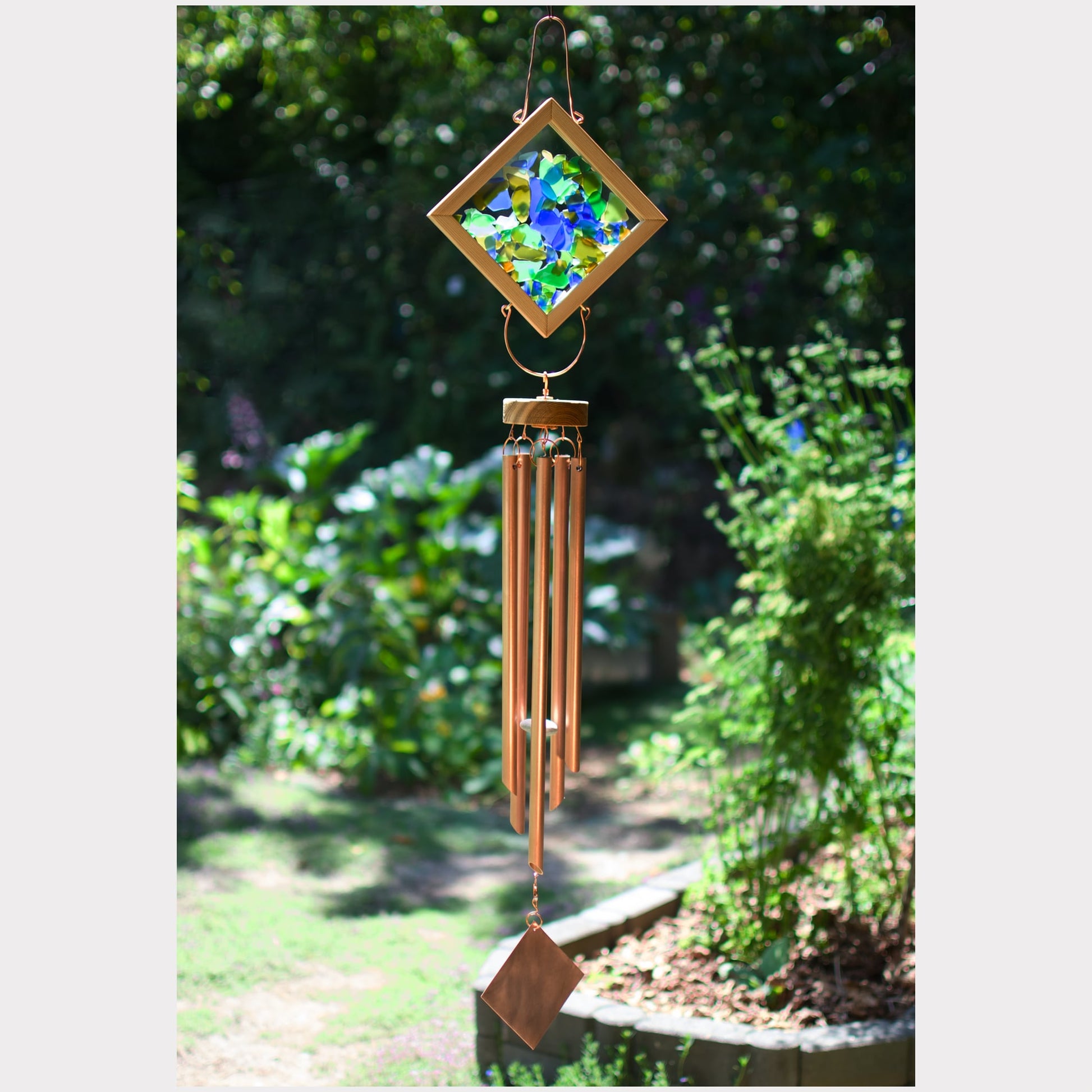 Large kaleidoscope wind chime featuring artist-made beach glass and 5 handmade genuine copper chimes.