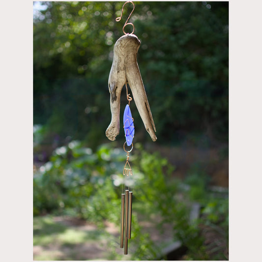 Driftwood and cobalt blue beach glass wind chime with three antiqued brass chimes.