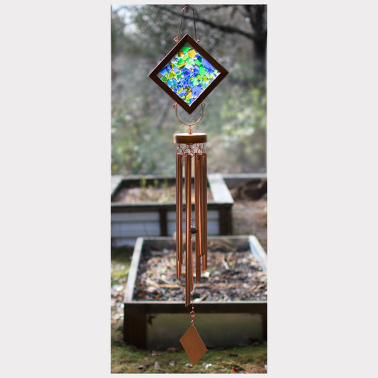 Large kaleidoscope wind chime featuring artist-made sea glass and seven genuine copper chimes.