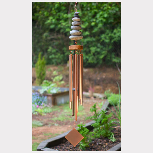 Zen wind chime featuring seven natural beach stones and seven genuine copper chimes.
