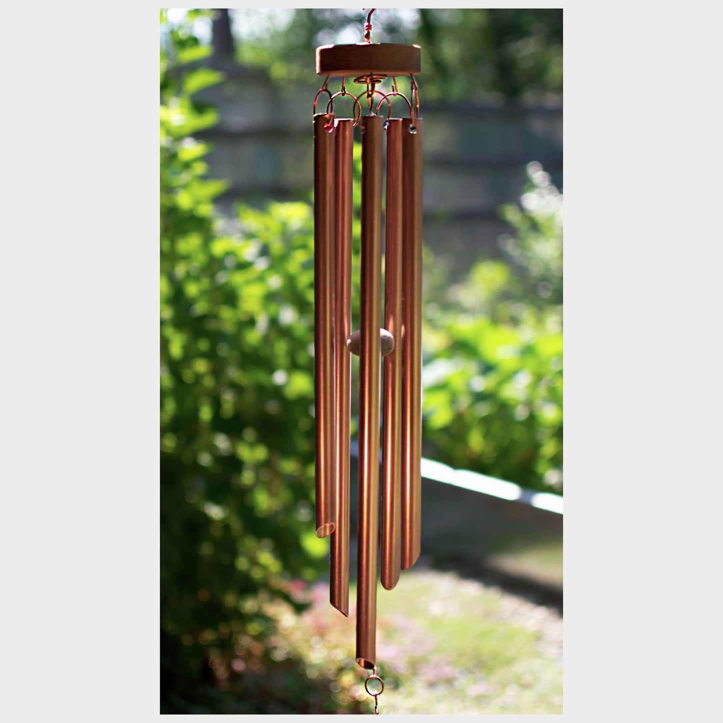 five handcrafted copper chimes
