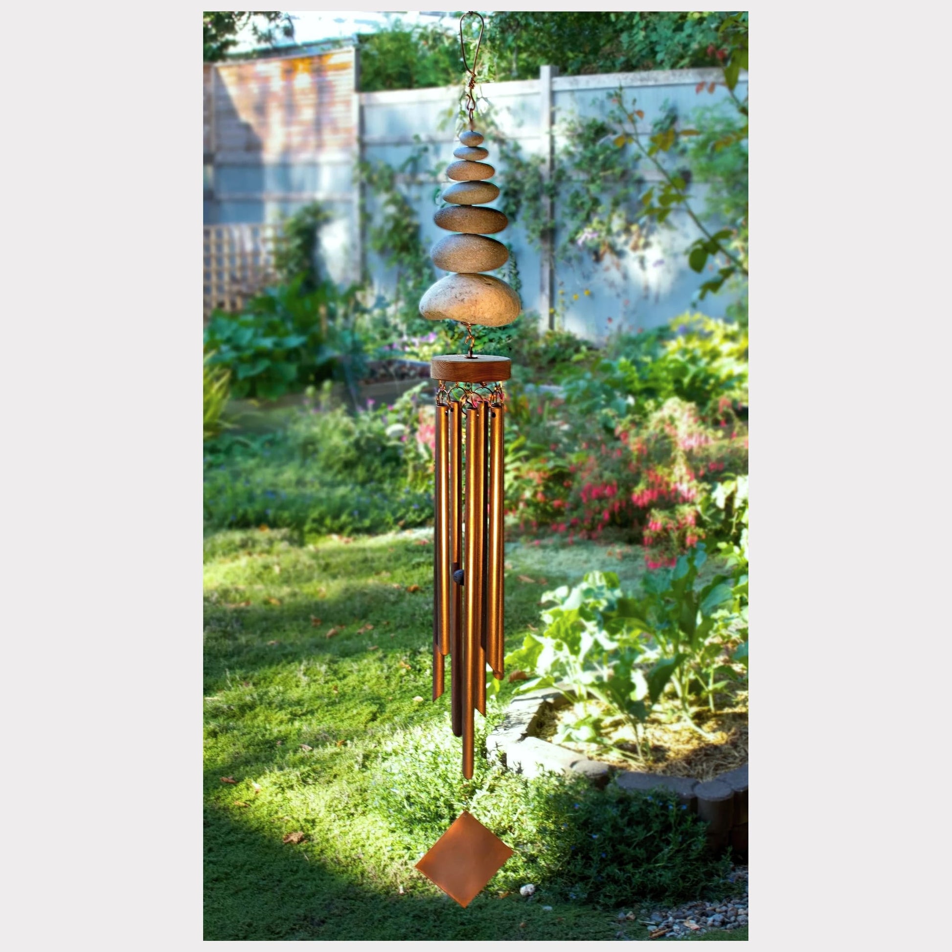 Handcrafted zen beach stone copper wind chime.