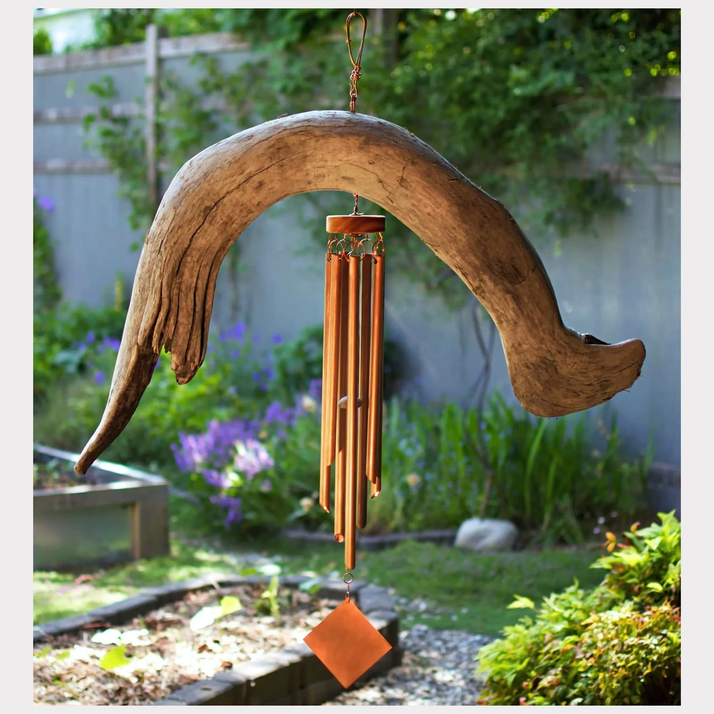 Huge natural driftwood wind chime with seven copper chimes.