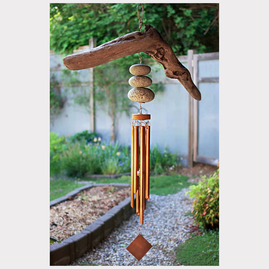 Very large driftwood beach stone wind chime with seven copper chimes.