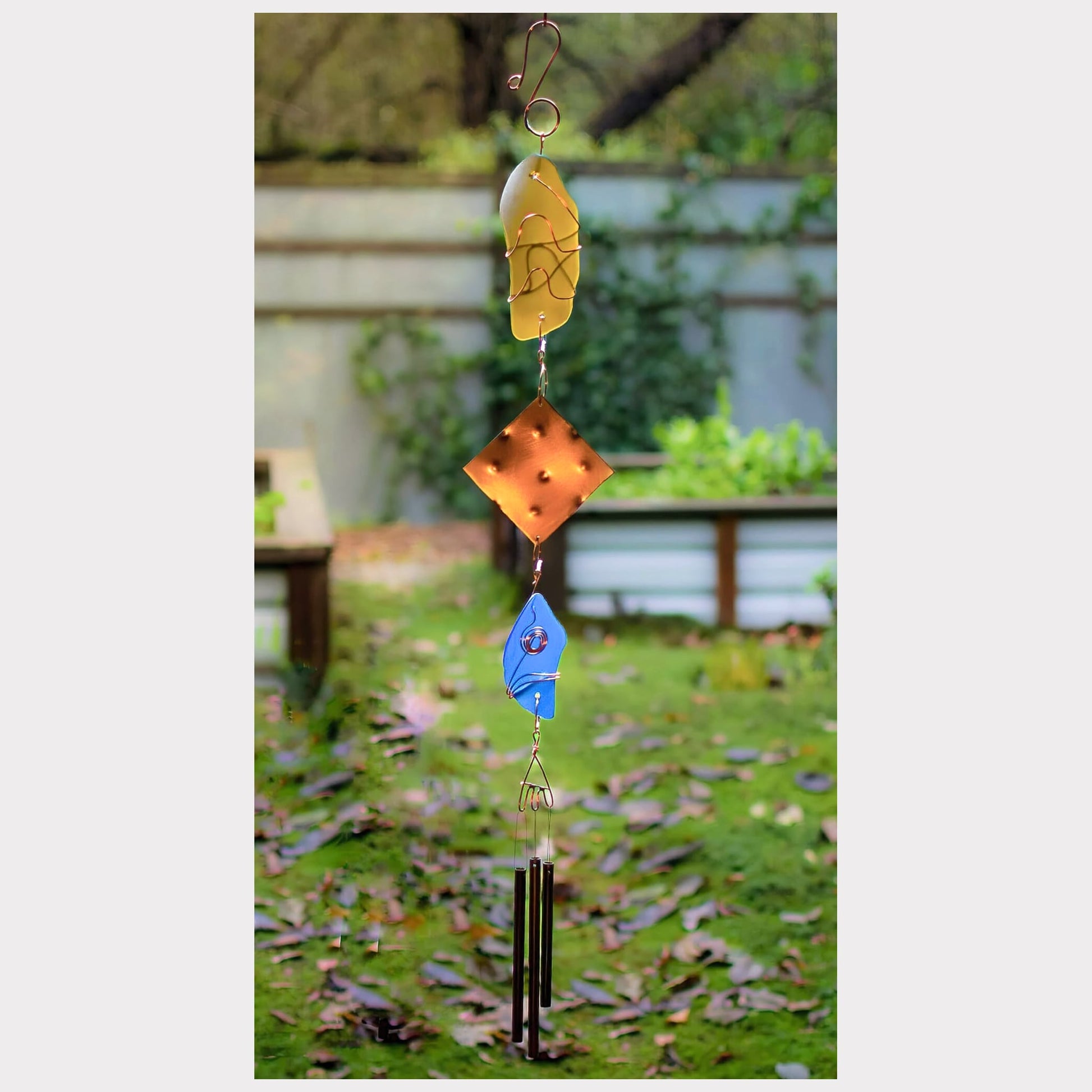 Handcrafted sea glass, copper, and brass wind chime.