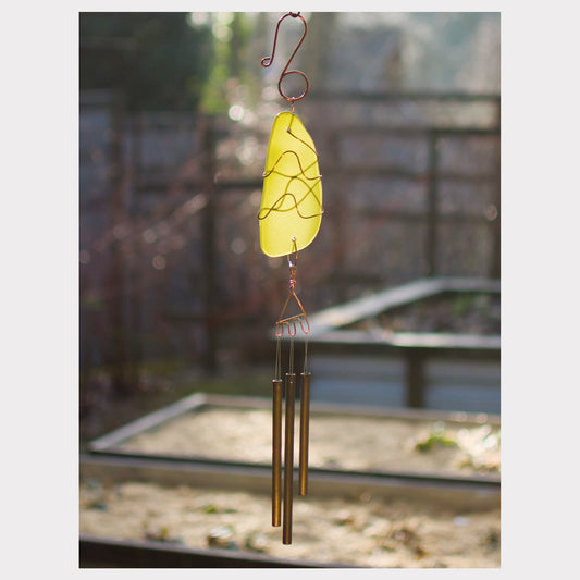 Copper wrapped sea glass chime, with three brass chimes.