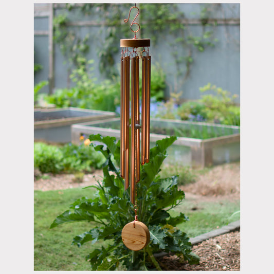 Large copper wind chime with a solid cedar windsail.