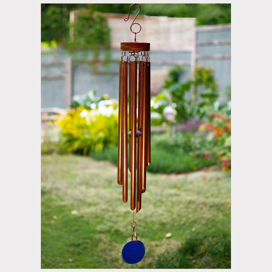Handcrafted copper wind chime with a cobalt blue glass windsail.