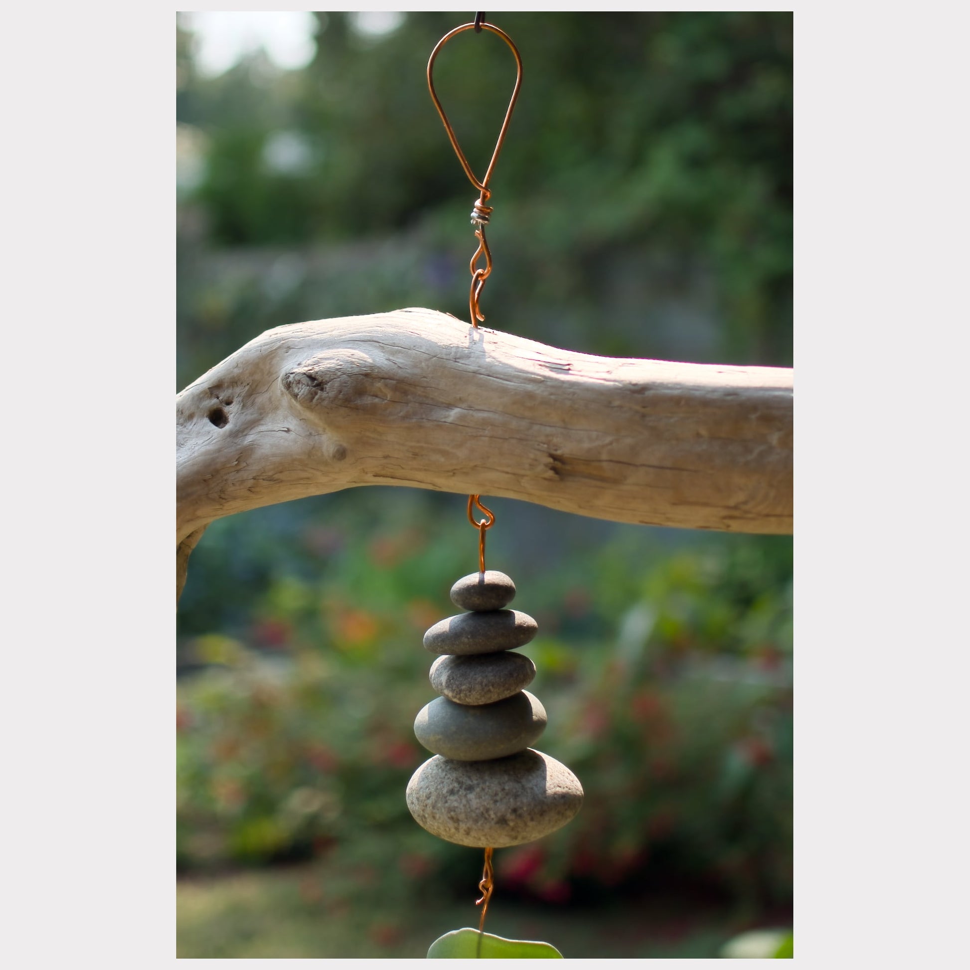 zoom detail, driftwood wind chime with a handcrafted copper loop hanger