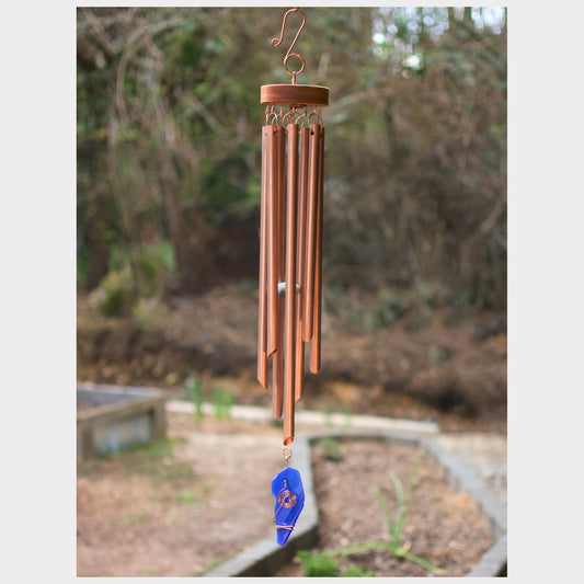 Large genuine copper wind chime featuring seven chimes and an artist-made beach glass windsail.