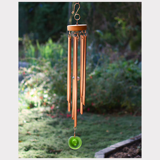 Handcrafted copper wind chime with a sea glass windsail.