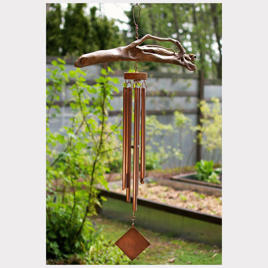 Large driftwood wind chime with seven handcrafted copper chimes.