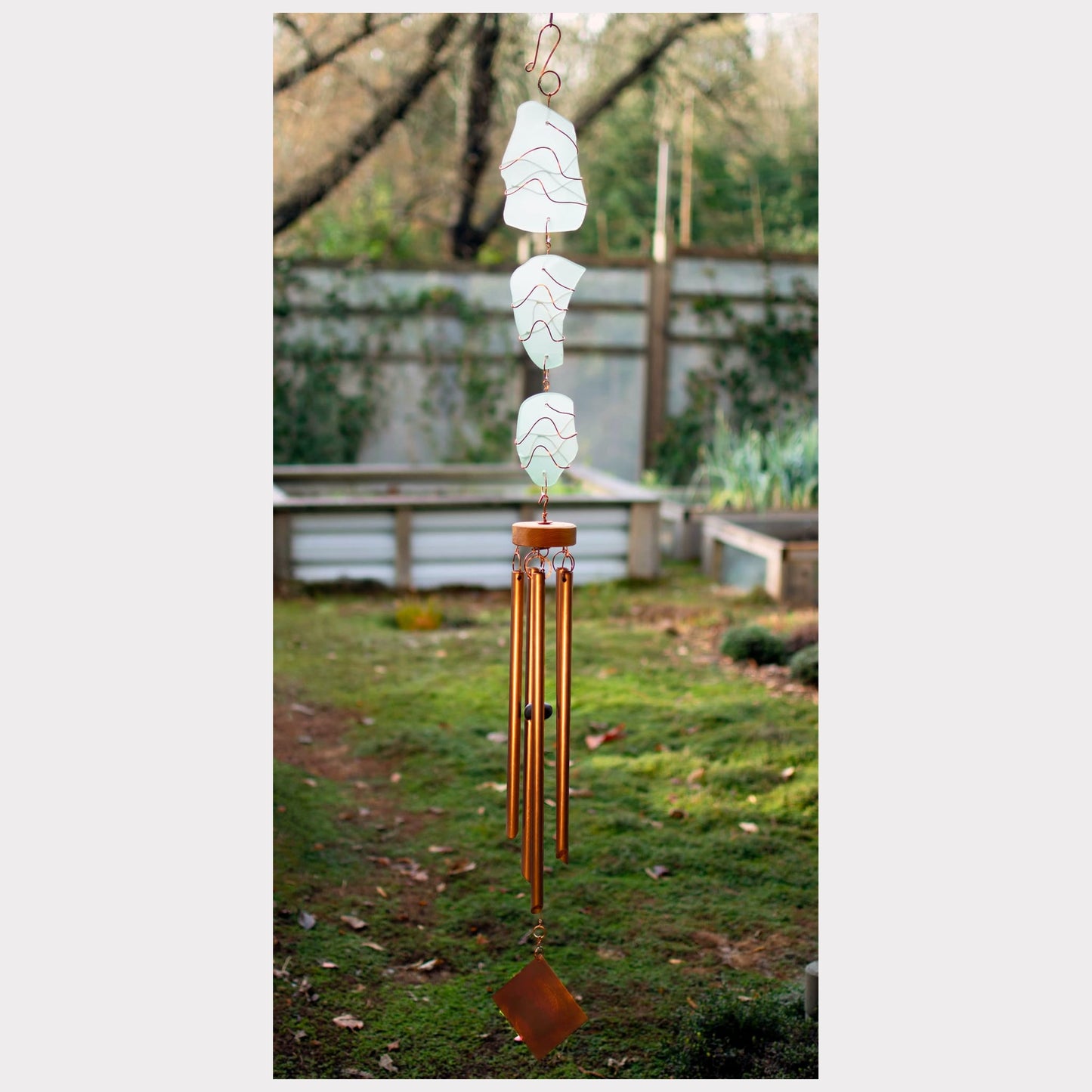 Large sea glass wind chime with copper chimes.