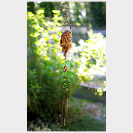 Driftwood wind chime with sea glass, handcrafted.