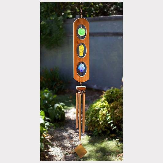 Handcrafted cedar, sea glass, and copper wind chime.