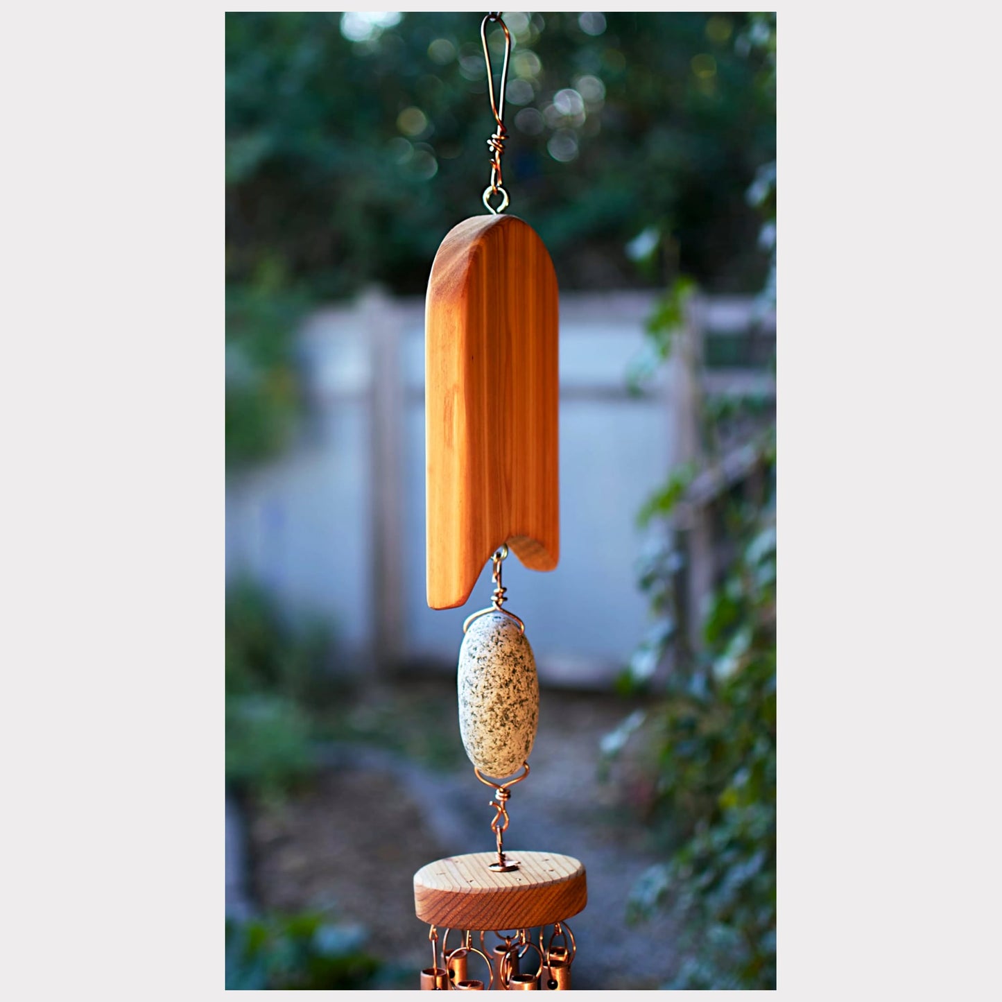 side view, cedar and beach stone wind chime