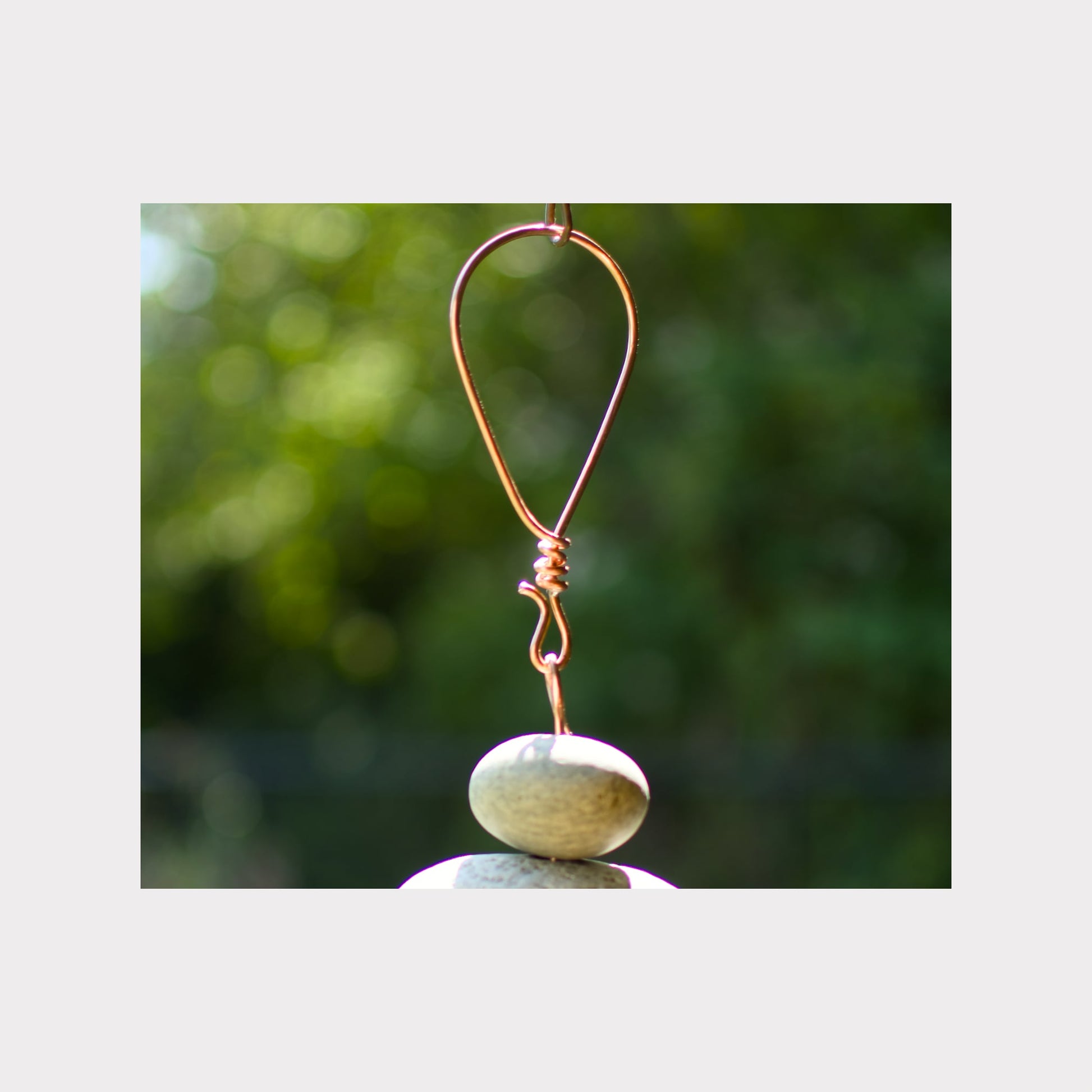 Detail, large copper hanging loop for a large wind chime.