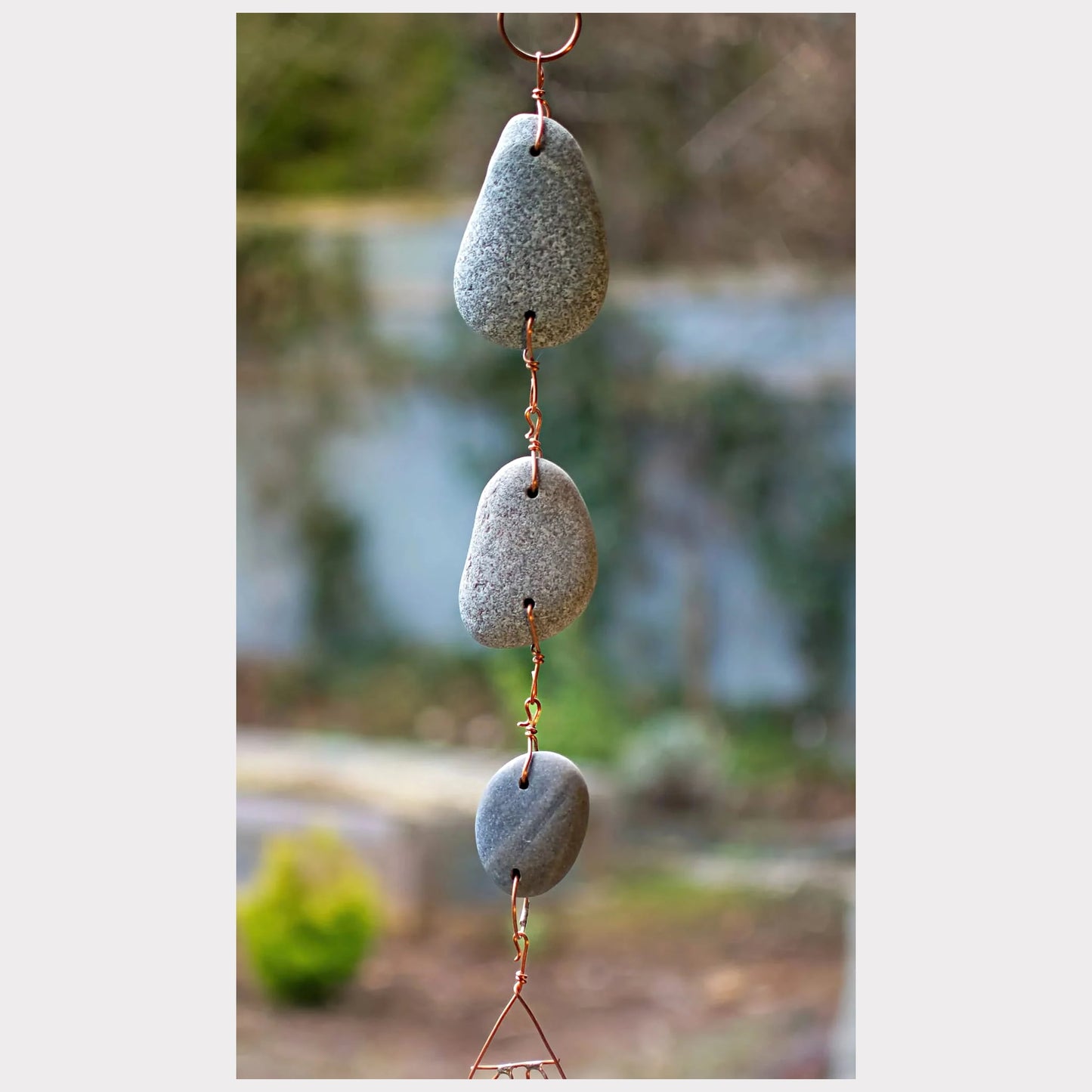 detail image, beach stone wind chime