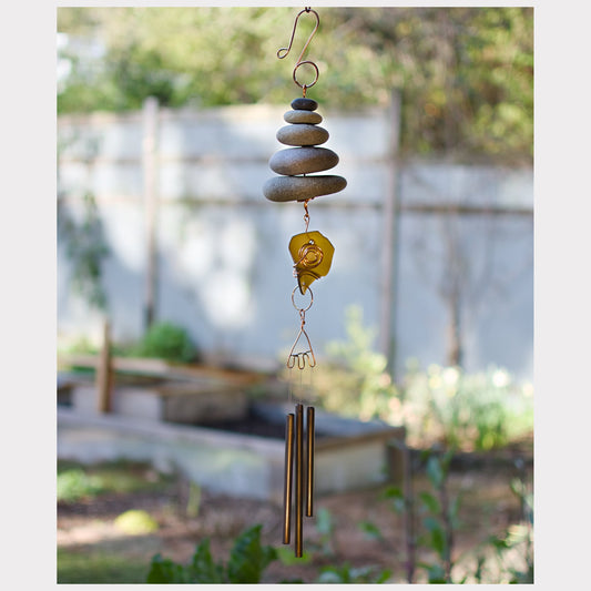 Handcrafted zen beach stone and sea glass wind chime.
