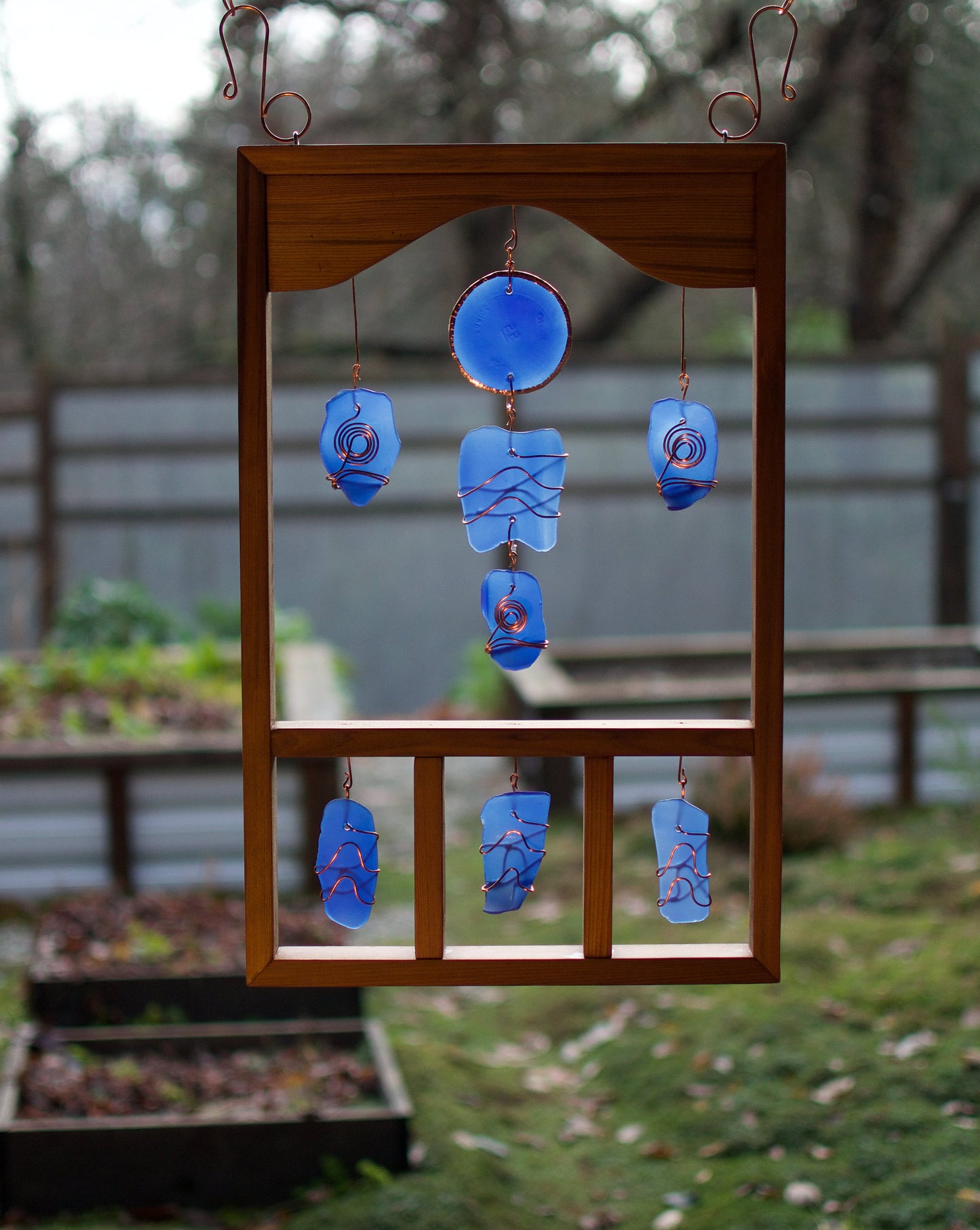 Attrape-soleil grand encadré en verre de mer en cuivre